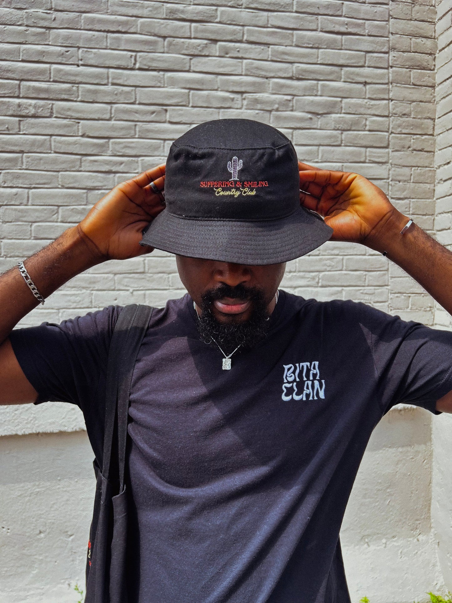 Suffering and Smiling Country Club Bucket Hat